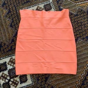 BCBG BANDAGE SKIRT IN LIGHT ORANGE